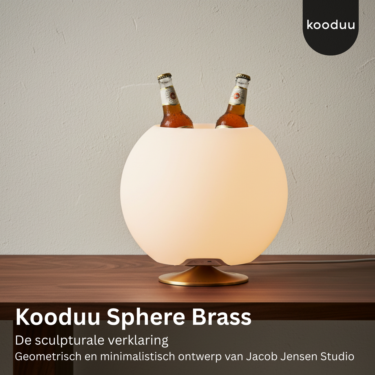 Kooduu Sphere Brass lamp with two bottles on a wooden surface and gray background