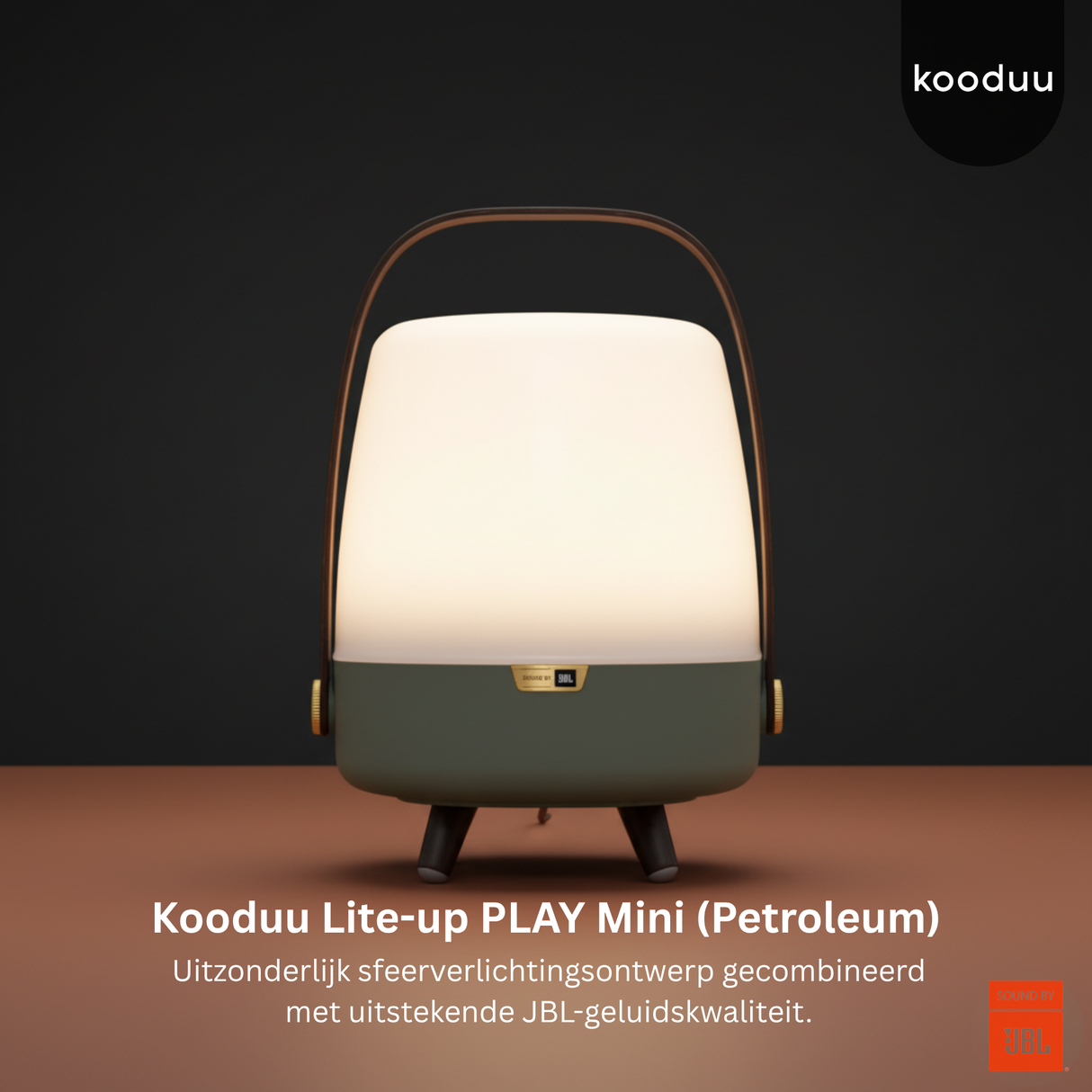 Kooduu Lite-up PLAY Mini (Petroleum) lamp on a dark background