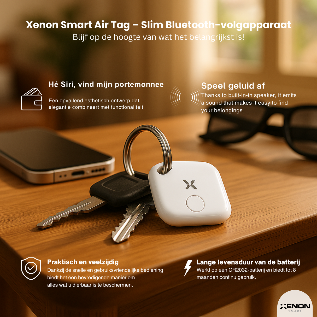Xenon Smart Air Tag on a table with keychain, phone, and glasses in the background.