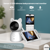 Xenon X7202 smart baby monitor with camera and display on a table.