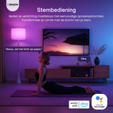 Woman practicing yoga in a room with a TV and lamp, demonstrating voice control with Alexa.